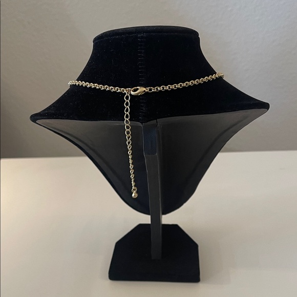 Elegant Gold Necklace with Cascading Discs - Picture 2 of 3